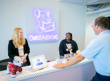 Datadog employees working together in an inclusive, collaborative office environment